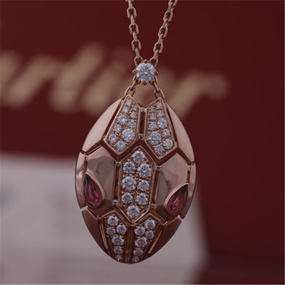 คุณภาพ สร้อยคอโรมัน Serpenti ในชุดทองคำ 18 กะรัต ประดับตา rubellite และประดับเพชรแบบพาเว โรงงาน
