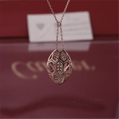 คุณภาพ สร้อยคอโรมัน Serpenti ในชุดทองคำ 18 กะรัต ประดับตา rubellite และประดับเพชรแบบพาเว โรงงาน